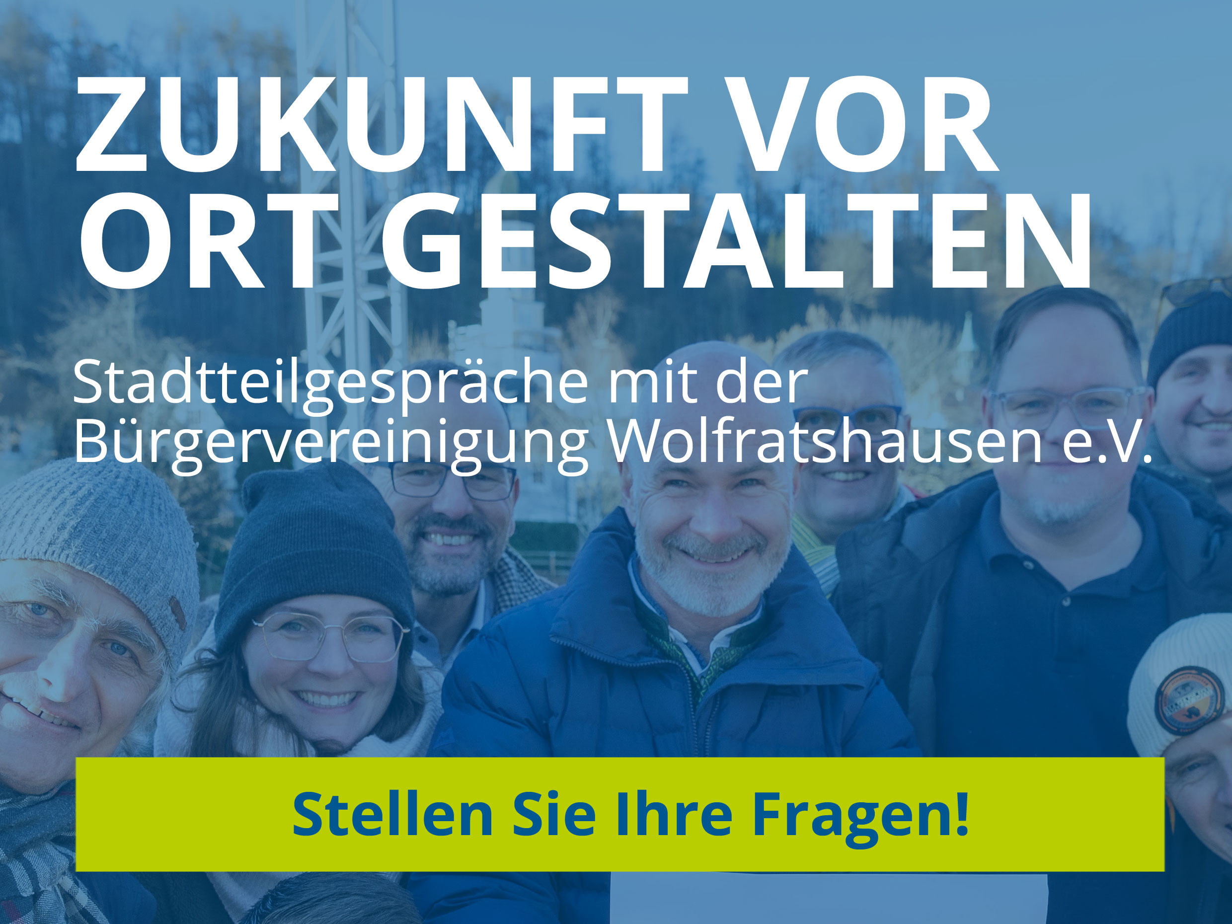 Gruppe von Menschen, die an Stadtteilgesprächen der Bürgervereinigung Wolfratshausen e.V. teilnehmen, mit einem Fokus auf Gemeinschaft und Engagement.